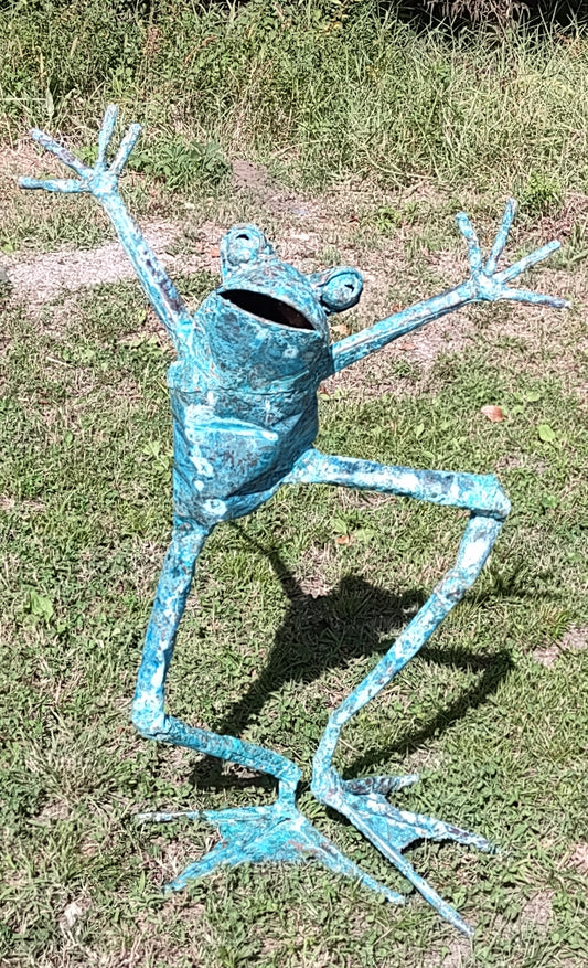 Dancer frog with fingers outstretched
