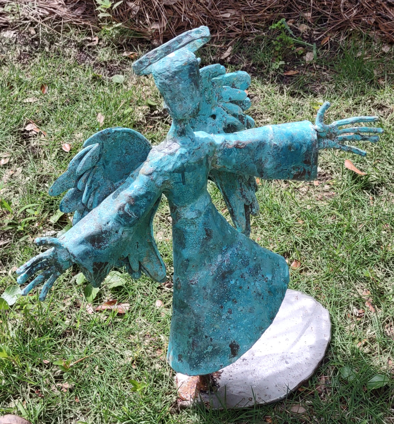 Angel made of copper, bronze and stainless steel