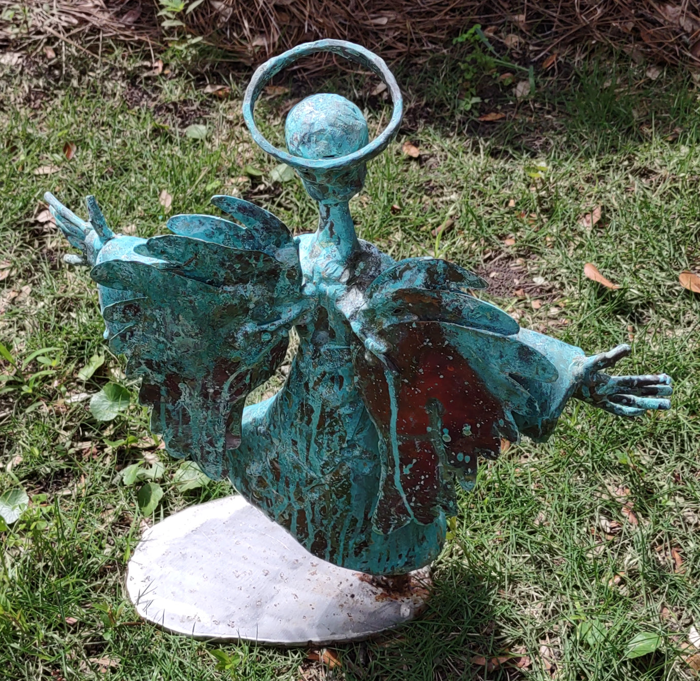 Angel made of copper, bronze and stainless steel