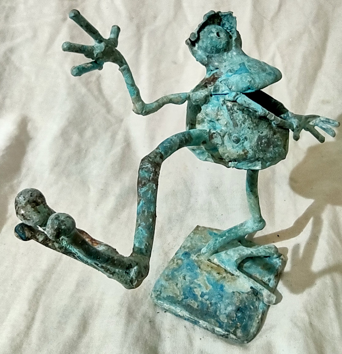 dancing copper frog, leg extended #1