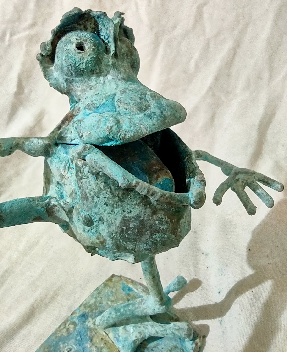 dancing copper frog, leg extended #1