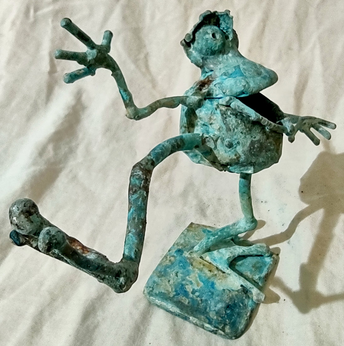 dancing copper frog, leg extended #1