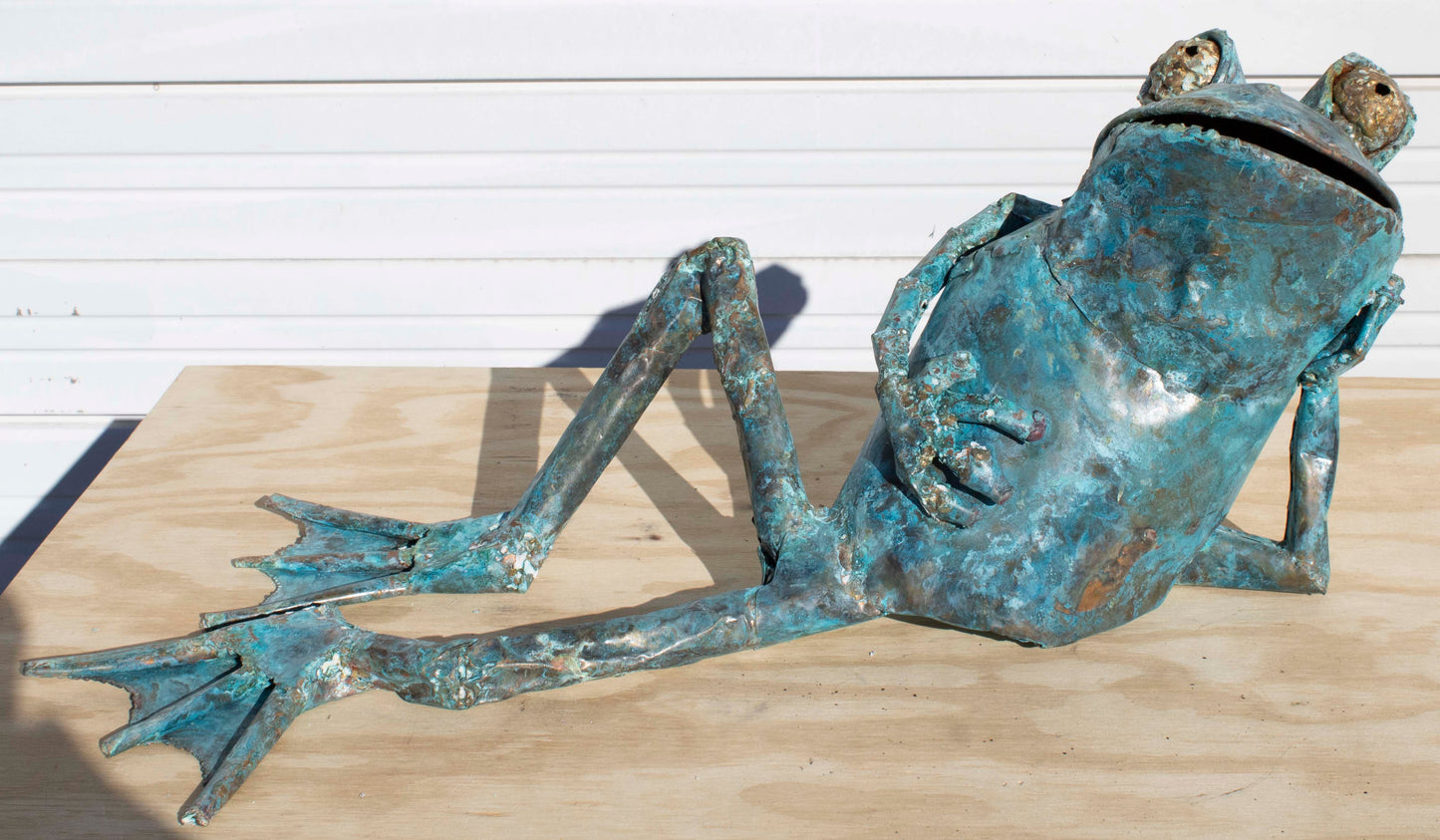 Medium-sized copper reclining Frog sculpture by Beau Smith