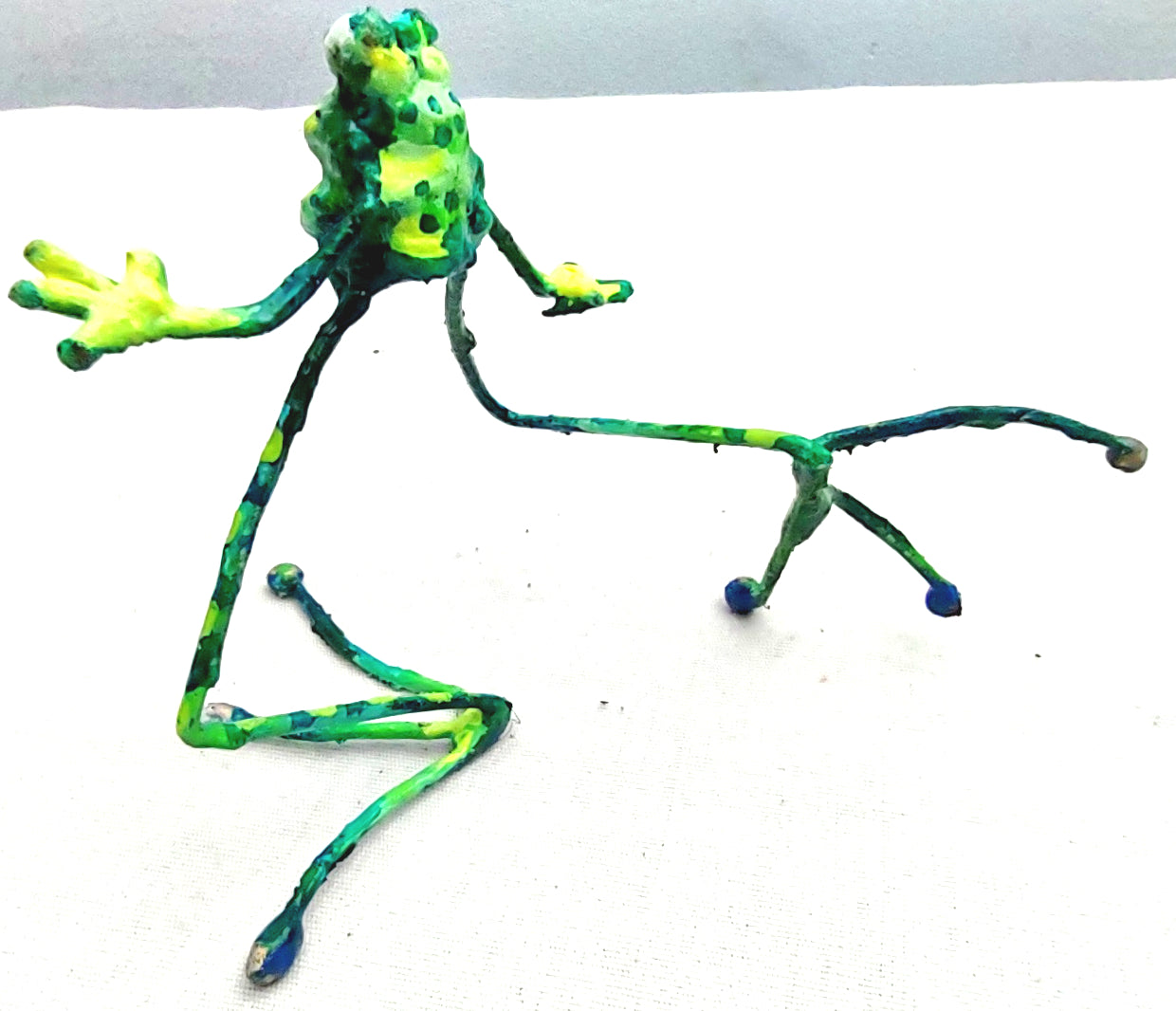 tiny steel painted frog running home #1